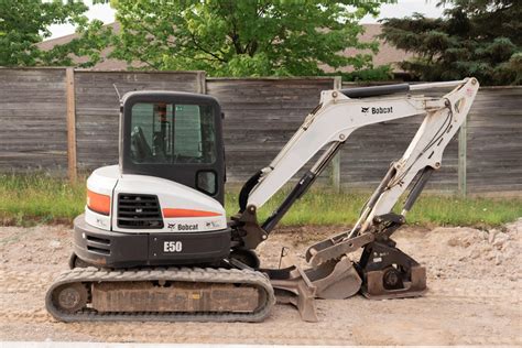 using a bobcat mini excavator|operating mini excavator video.